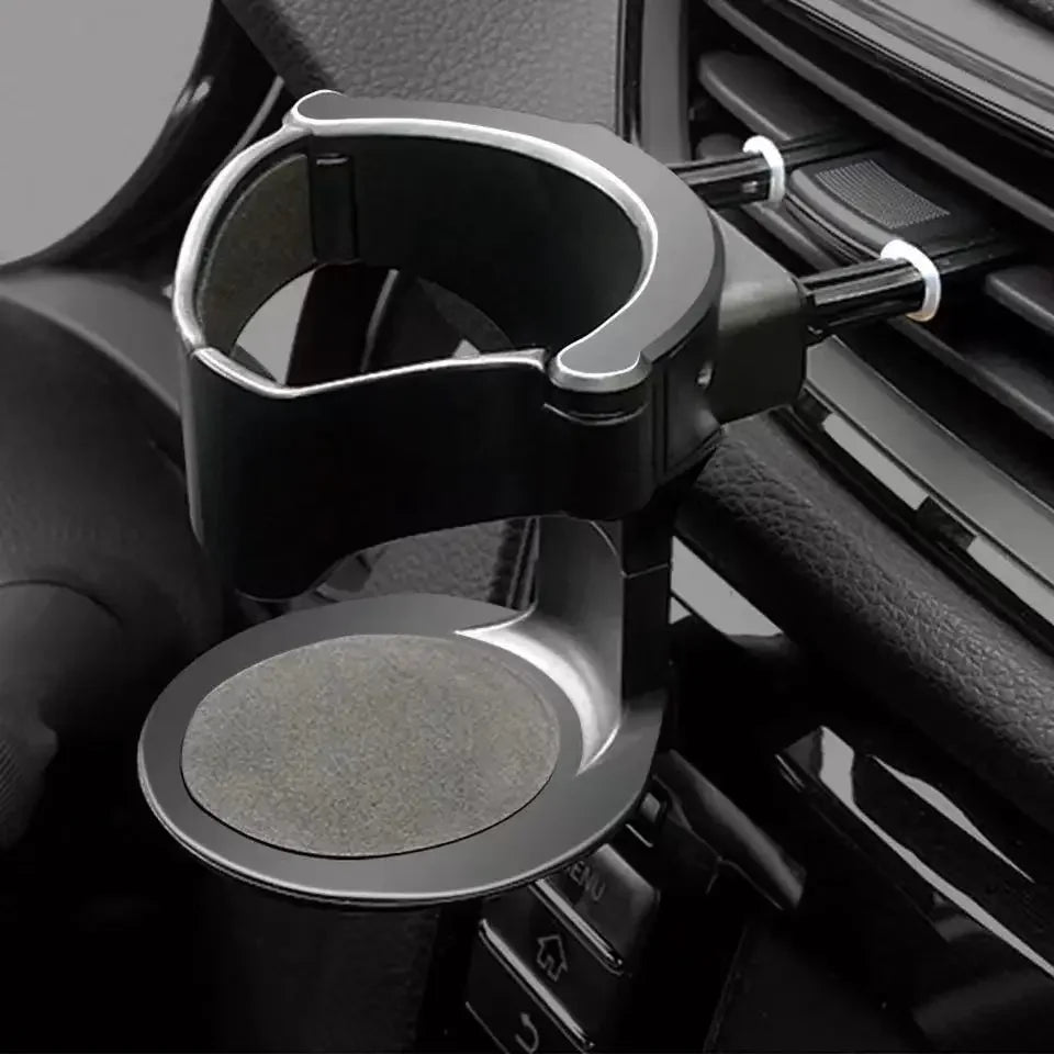 Schwarzer multifunktionaler Organizer-Tray mit gebogener Halterung in Innenraum eines Autos.