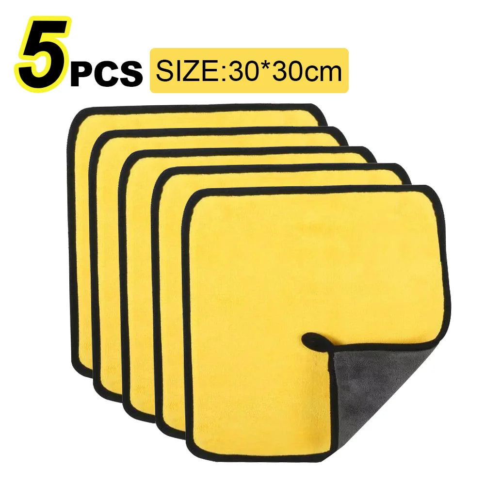 Five yellow microfiber car washing towels stacked together