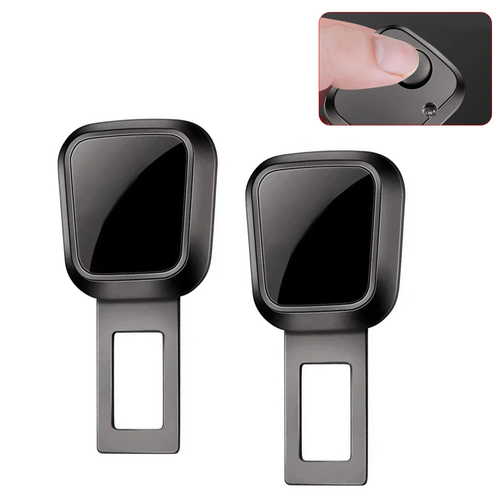 A pair of black car seat belt extenders with quick-release buckles shown against a white background.