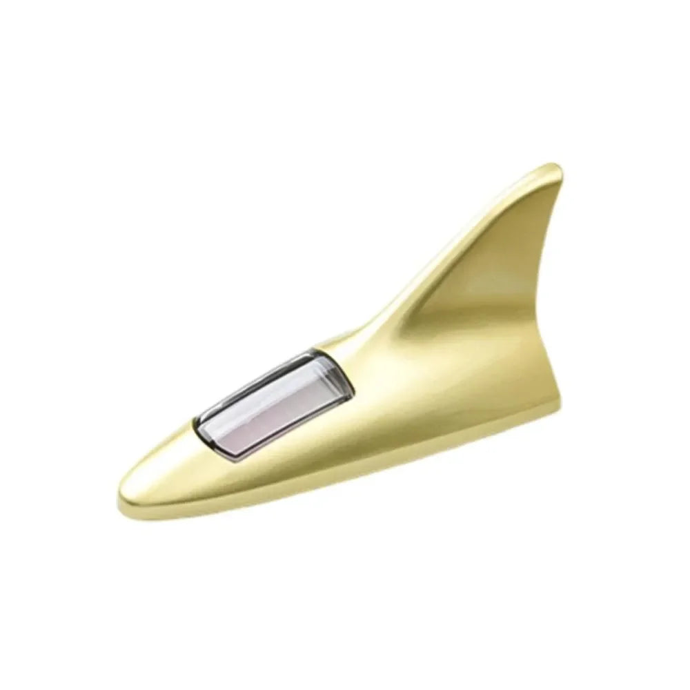 A gold-colored solar powered LED warning tail light antenna.