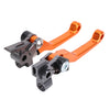Embrague y manetas de freno CNC para motocicletas KTM en negro y naranja.