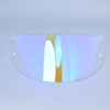 A clear motorcycle helmet visor with a gradient tint featuring yellow and blue hues.
