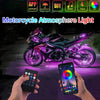 A motorcycle is illuminated with purple light, demonstrating the atmosphere light effect.
