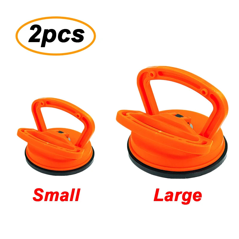 Two orange car dent glass suction removal tools, small and large versions.