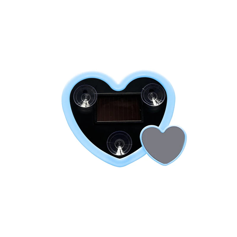 A heart-shaped solar lamp with a clear blue border and a dark rectangular solar panel inside.