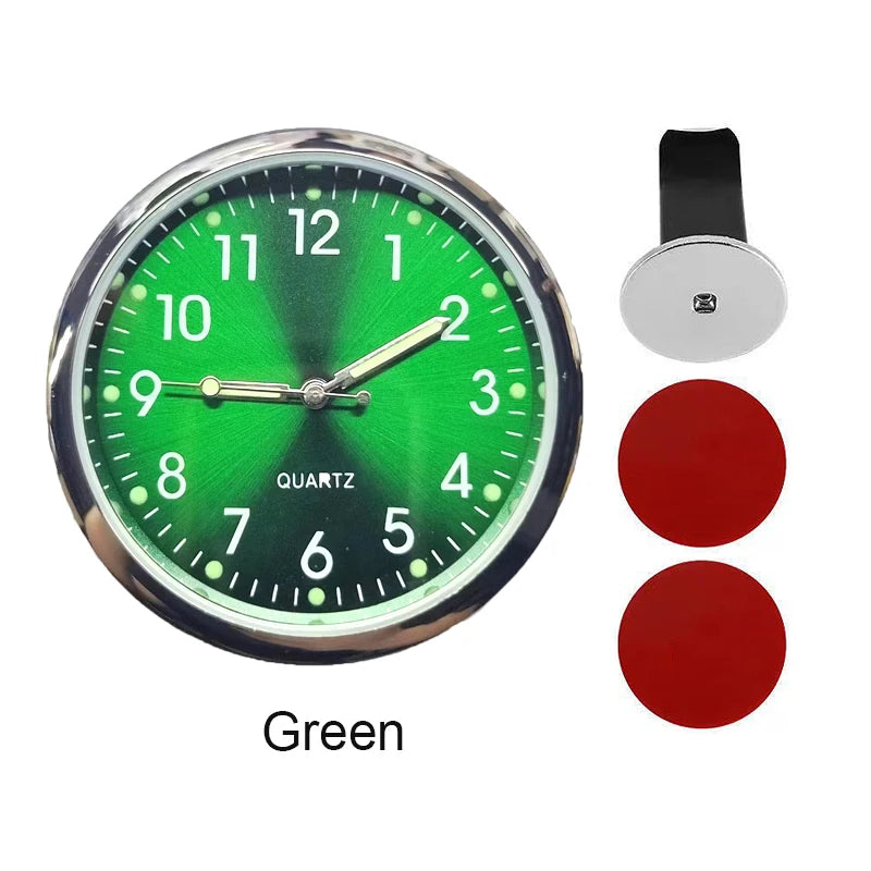 A green quartz stick-on car clock face with hands and a separate mounting piece.