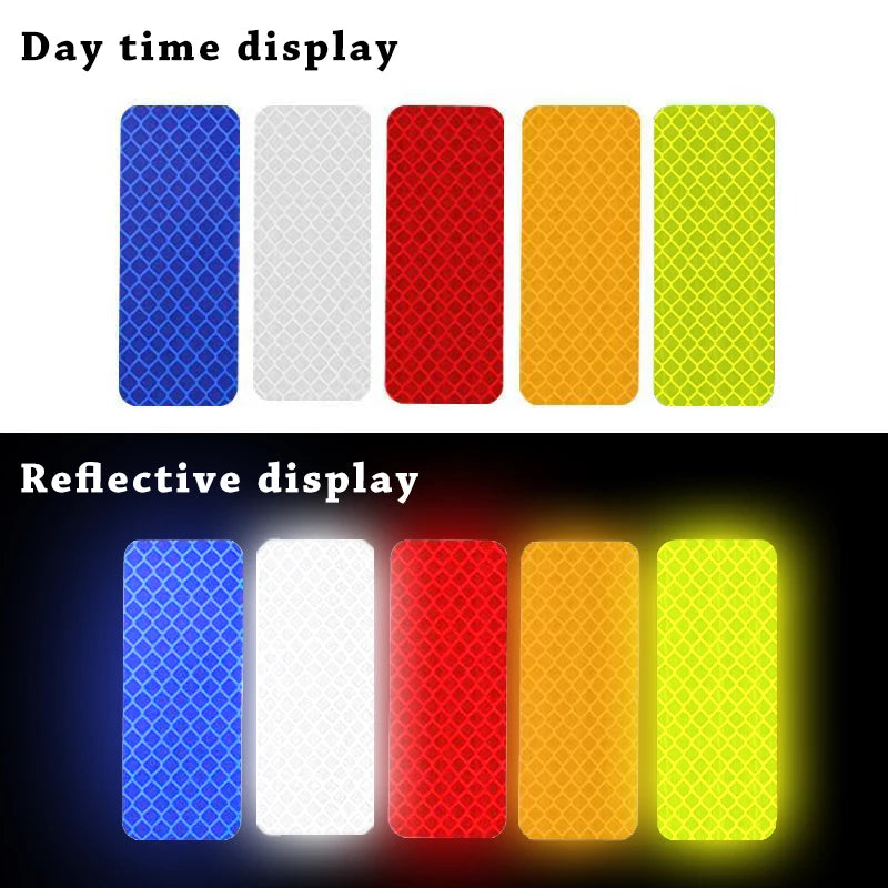 A display of high-visibility reflective safety strips in blue, white, red, orange, and yellow.