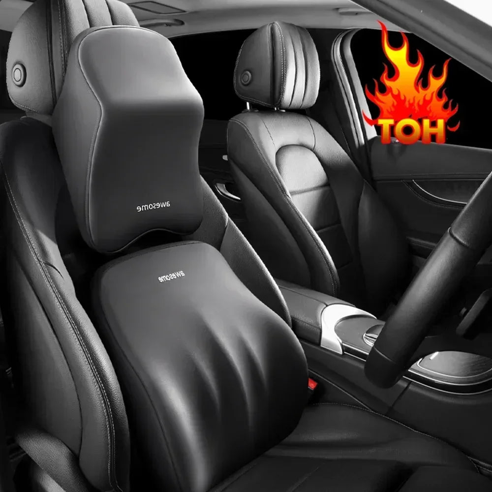 Interior view of a car seat showing an ergonomic headrest cushion for neck and shoulder support.
