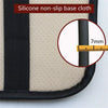 A black and beige silicone non-slip base cloth pad for a universal car armrest protector.