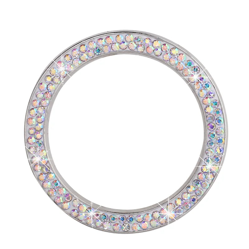A circular cover for a car start button decorated with sparkling diamond rhinestones.