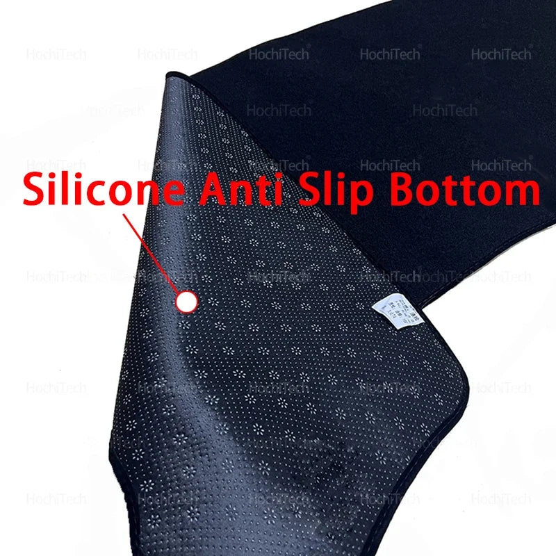 Close-up view of a black silicone anti-slip bottom dashboard cover for a Mitsubishi Eclipse.