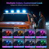 Multiple colors of solar-powered RGB roof marker lights illuminating a vehicle in the dark.