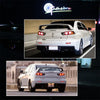 A white Mitsubishi Lancer Evolution X with LED rear bumper reflector lights and sequential turn signals.