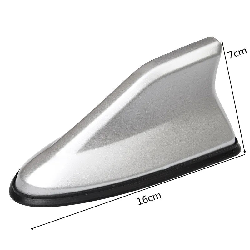 Silver carbon fiber look roof mount antenna with dimensions 7cm by 16cm