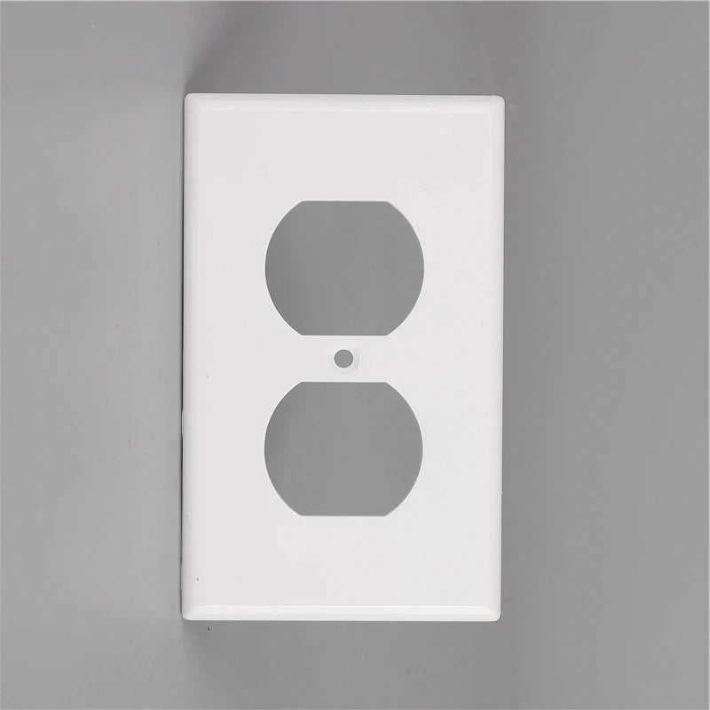 A white electrical light switch cover plate with two circular cutouts for switches.