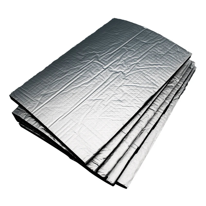Stack of silver heavy duty sound deadening mats for automotive