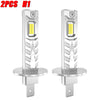 Two pieces of H1 LED car headlight conversion kits with silver housing and yellow light bulbs.
