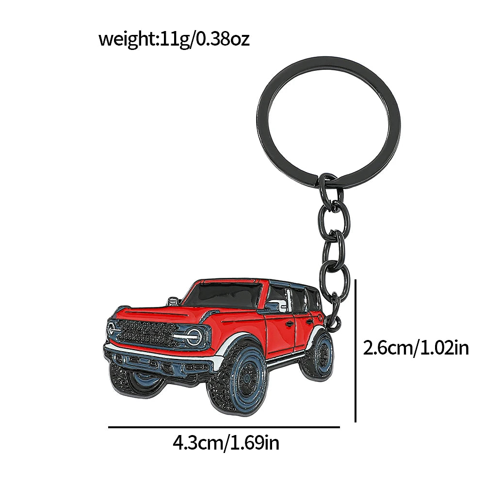 A red classic alloy car keychain featuring a detailed vehicle model and a black split ring.