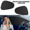 A black driver and passenger sunshade is shown installed on a car windshield.