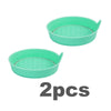 Two teal silicone rhinestone car cup holder coasters with textured bottoms