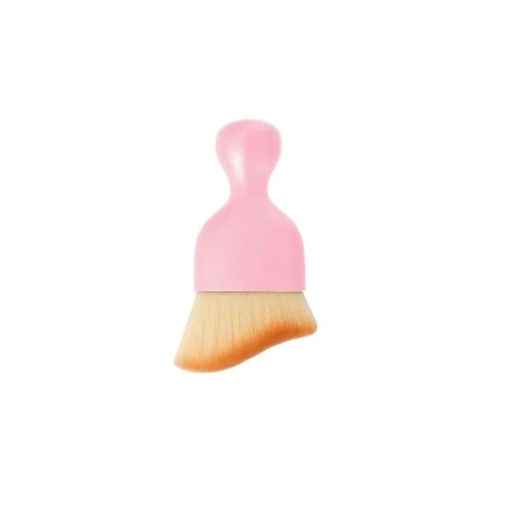 A pink curved silicone brush used for cleaning car interiors.