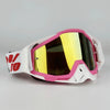 Pink and white off-road motorcycle riding goggles with yellow tinted lenses