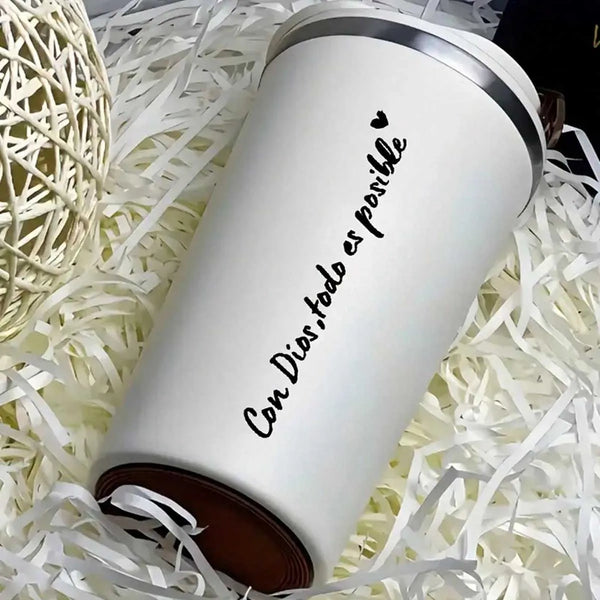 A white car mirror is decorated with the black Spanish phrase Con Dios todo es posible resting on a bed of white shredded pap