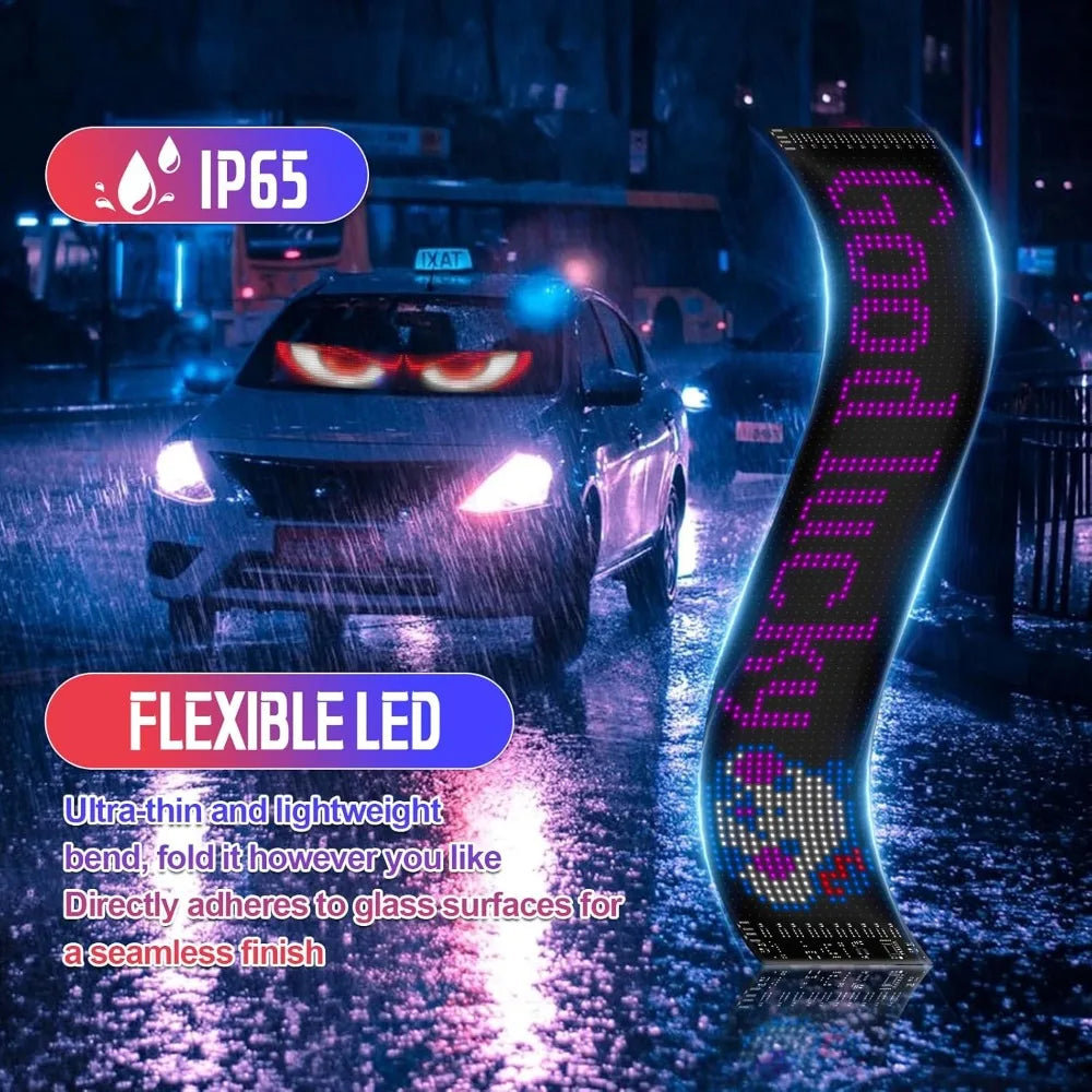 Flexible LED matrix light adhered to a glass surface, displayed in a nighttime street setting.