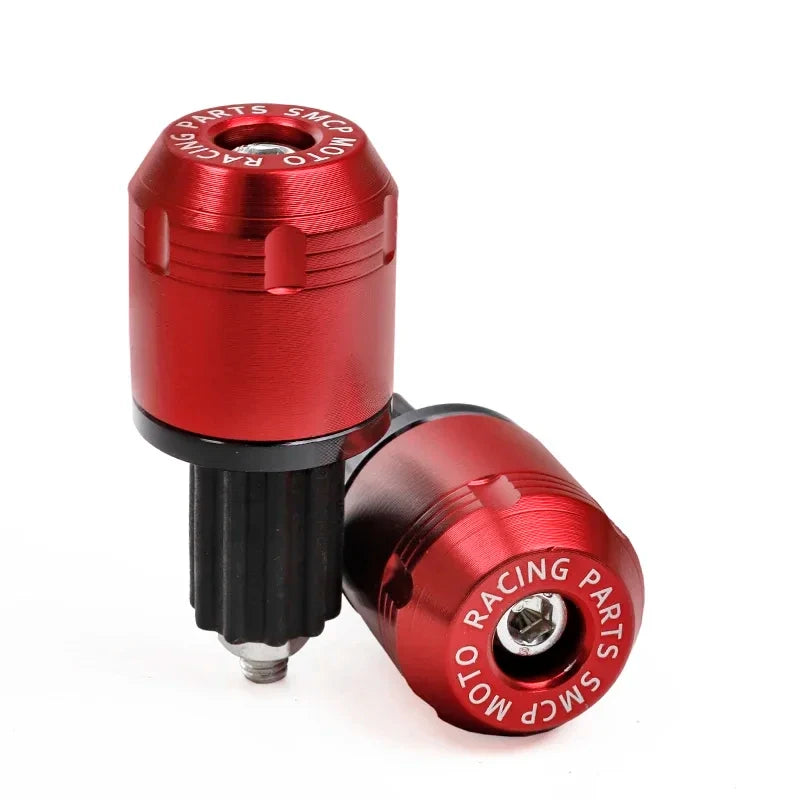 A close-up view of a red motorcycle handlebar end plug with markings for racing parts and SMC.