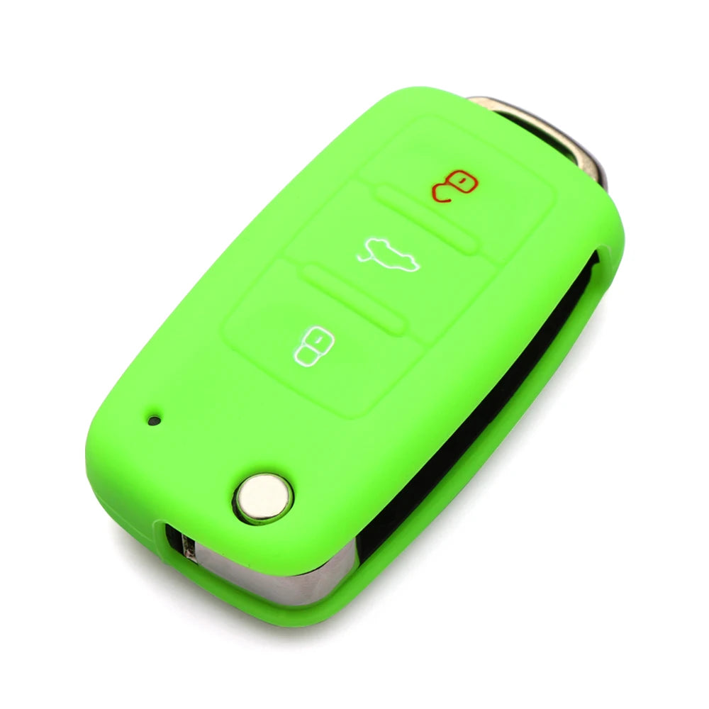 A bright lime green silicone car key cover with three buttons and a silver metal frame.