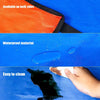 A blue car trunk liner mat showing waterproof material and ease of cleaning with a cleaning wipe.
