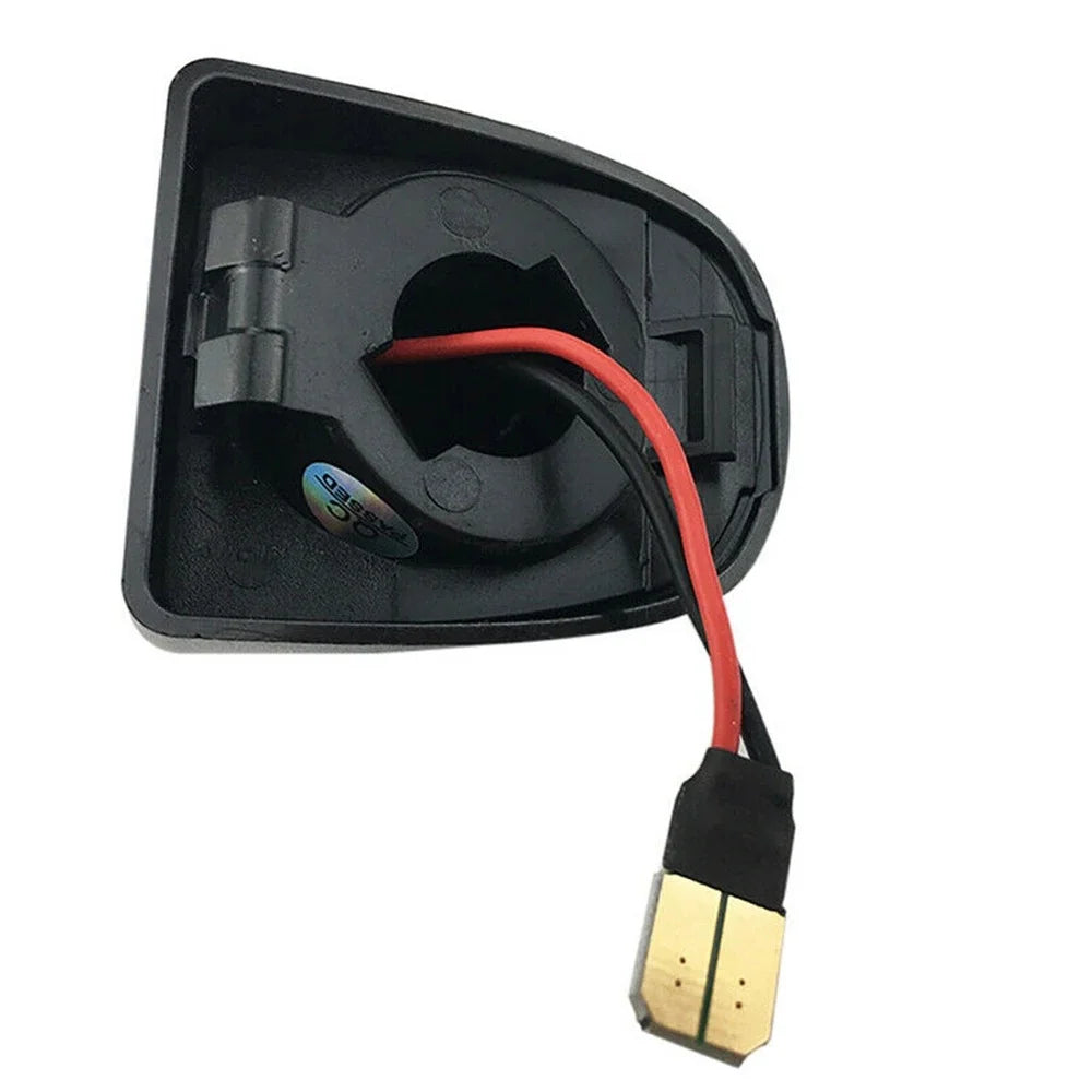 A black plastic housing for 18 LED license plate lights with a red wire connected to a gold-plated connector.