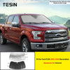 Aluminum foil windshield sunshade for a Ford F150 truck.