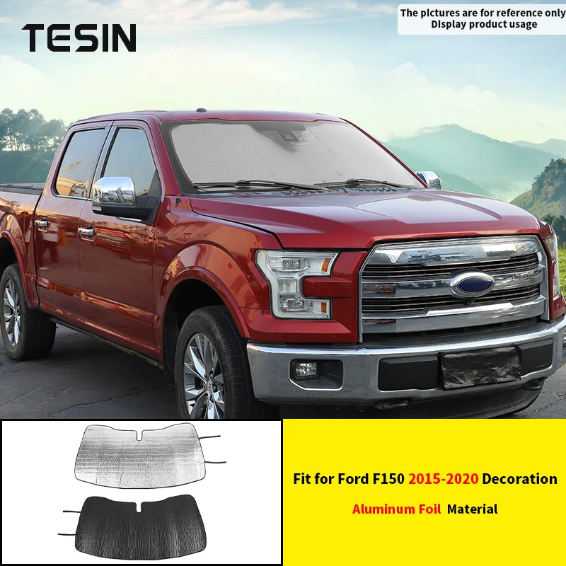 Aluminum foil windshield sunshade for a Ford F150 truck.