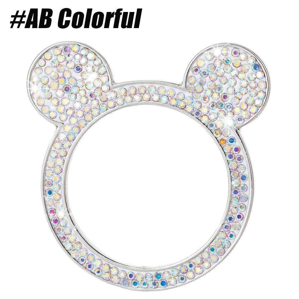 Tapa de perilla de ignición circular decorada con pedrería brillante en colores pastel.