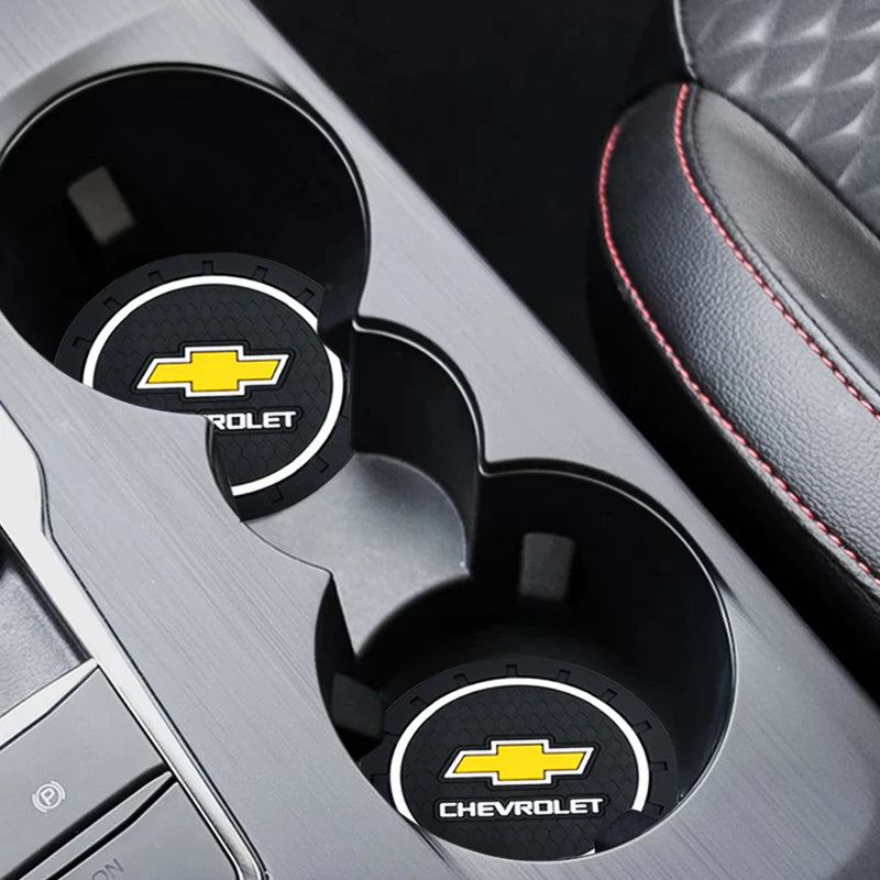 Close-up view of a Chevrolet branded car anti-slip coaster set in a silver holder.