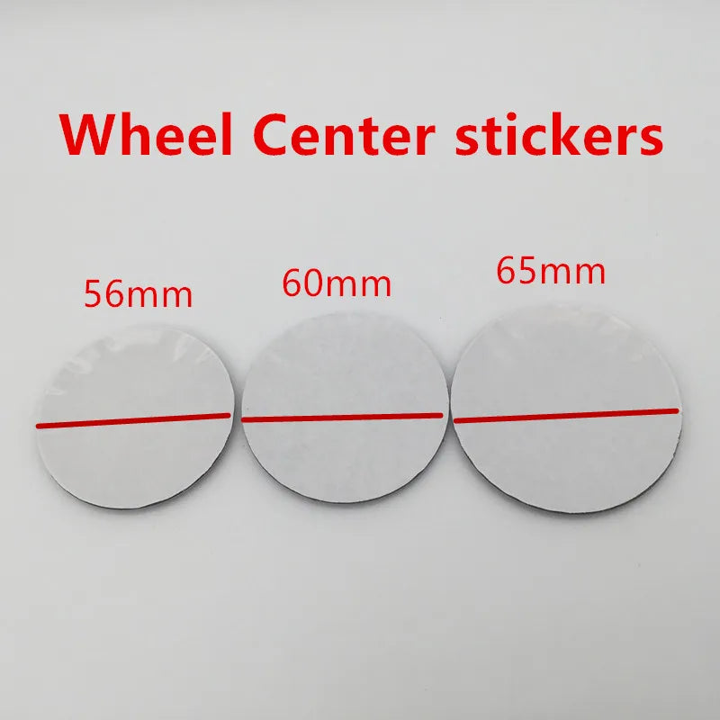 Three round white stickers marked with diameters of 56mm, 60mm, and 65mm for car wheel center caps