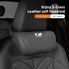 A black leather soft headrest neck pillow for an S-Class car seat.