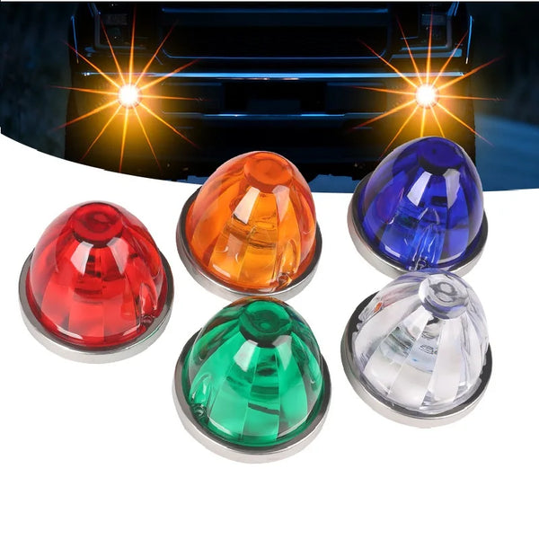 A collection of four universal DC side marker lights in red, orange, blue, and clear plastic.