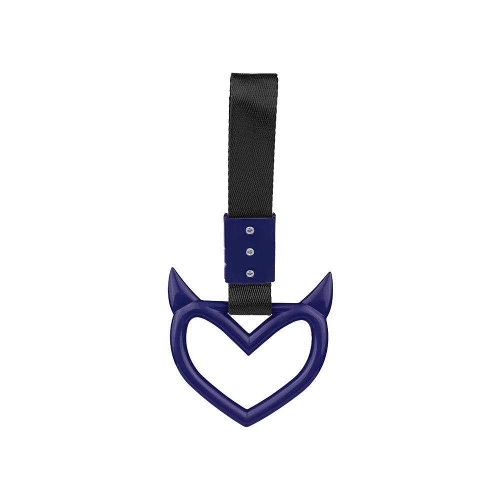 Black strap handle accessory with a heart shape design for automotive use