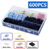A clear plastic container holds various colored heat shrink wire terminals for electrical wiring projects.