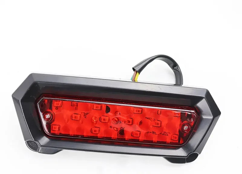 A black universal LED motorcycle brake tail light assembly.