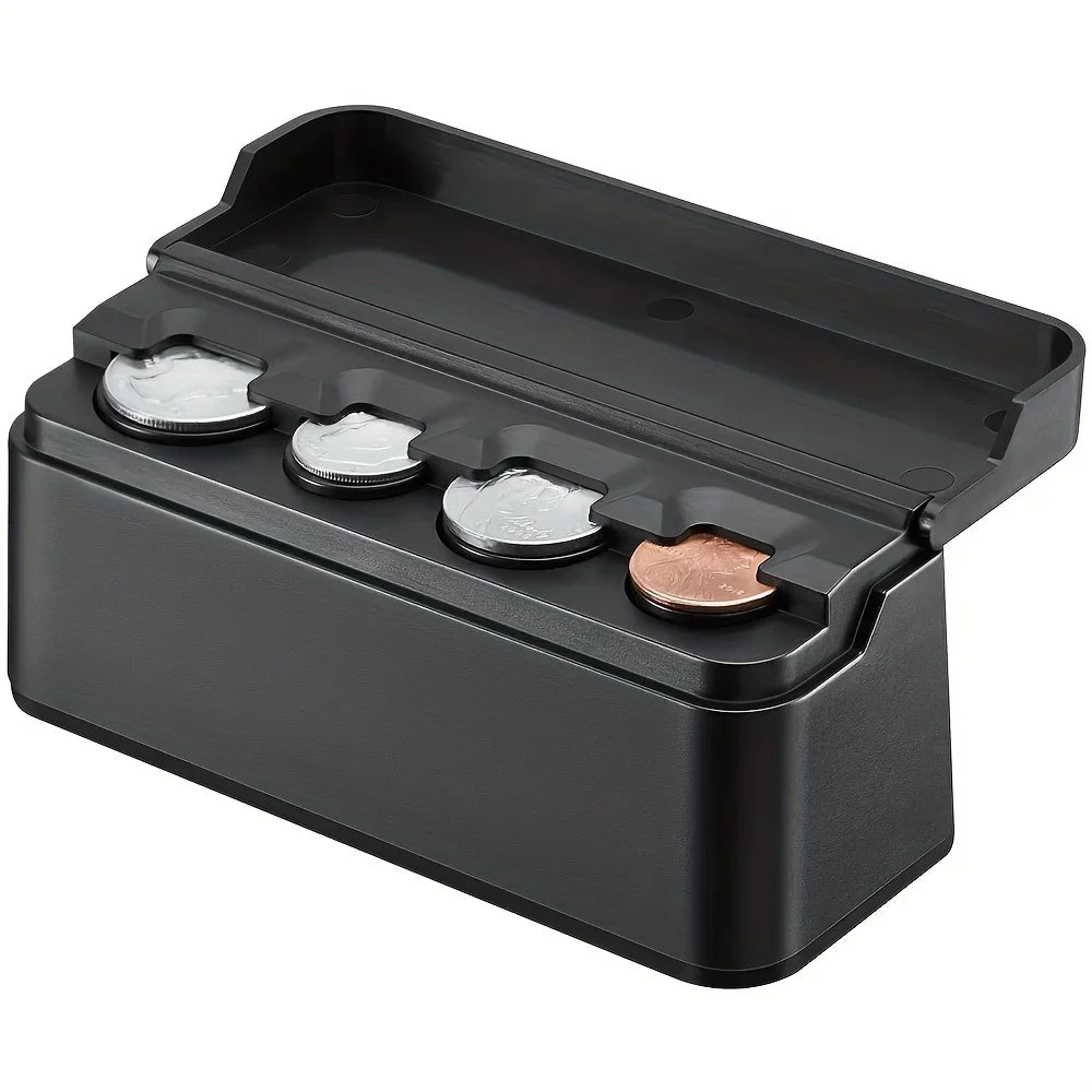 A black universal coin storage box with four slots for holding coins.