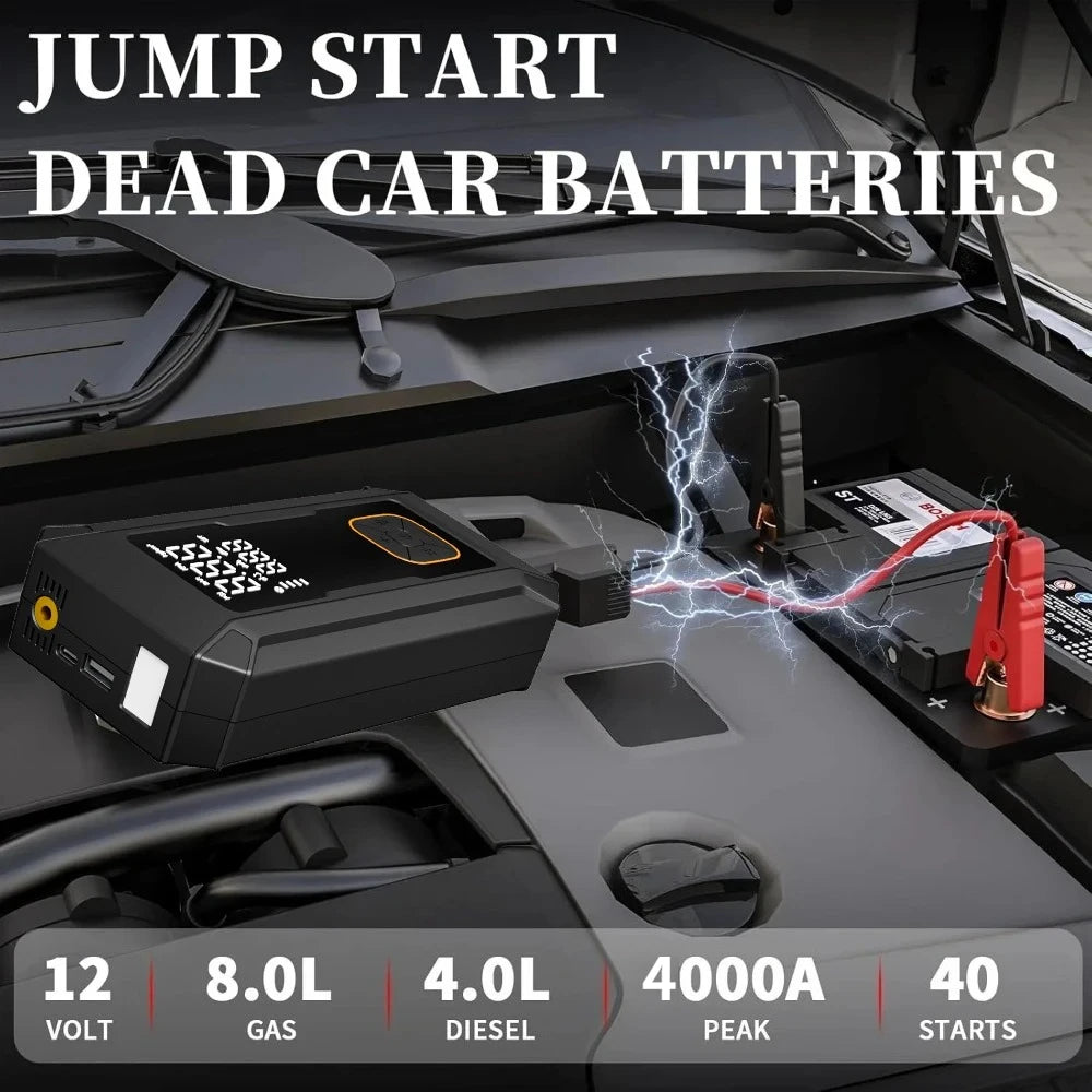 A black jump start device is shown in the engine compartment of a car, ready to jump start dead batteries.