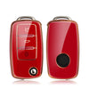 A pair of red TPU car key covers with metallic accents for Volkswagen, Skoda, and Seat vehicles.
