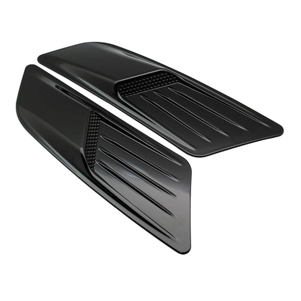 Black retrofit false air outlet hood for a Ford Mustang