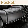 A close-up view of black leather car front seat covers installed on a vehicle interior.