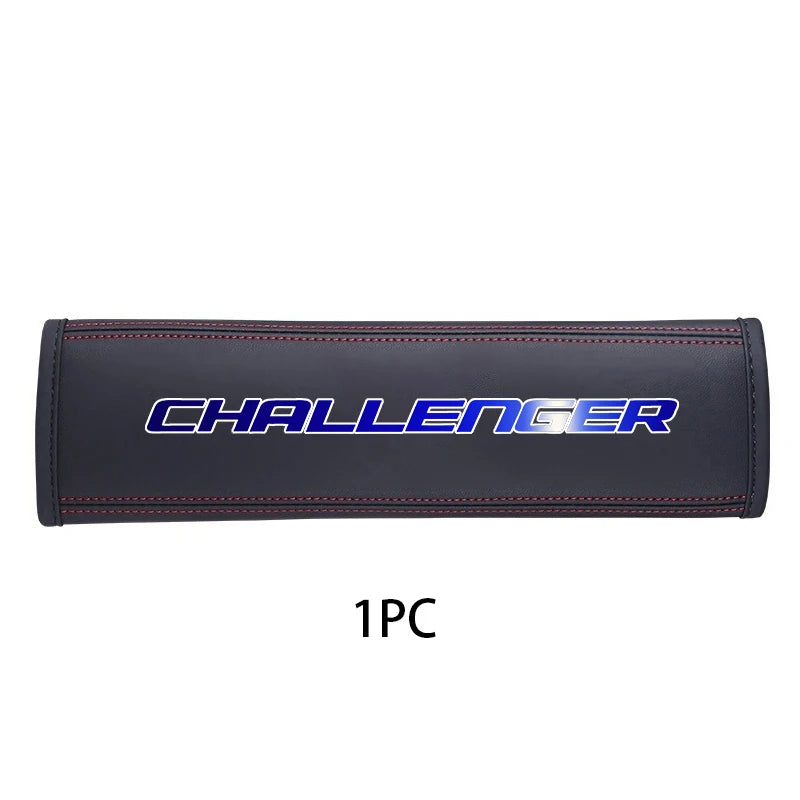 Black leather car seat belt shoulder strap pad with silver lettering
