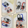 A collection of various colored and style lock carabiners and keychains displayed on a white background.