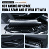 A black leather storage case is shown fitting into a seam in a car interior.